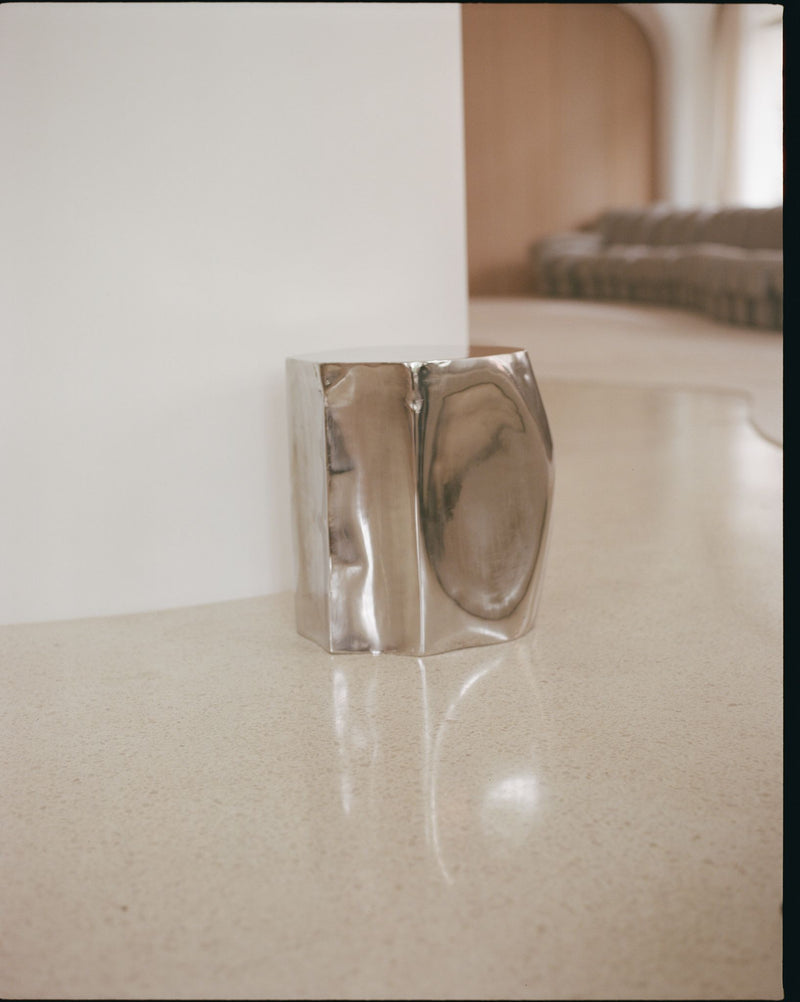 ROCHER SMALL TABLE IN POLISHED STAINLESS STEEL